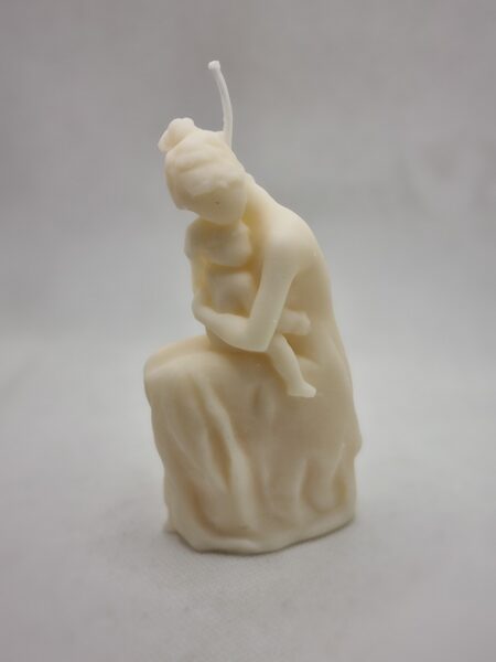 Bougie d'une femme qui porte un enfant